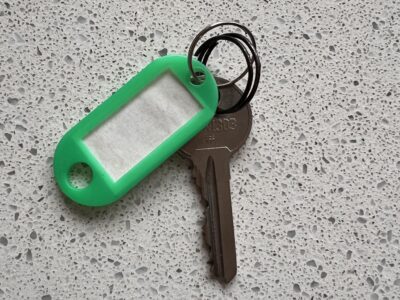 Keys with green keychain